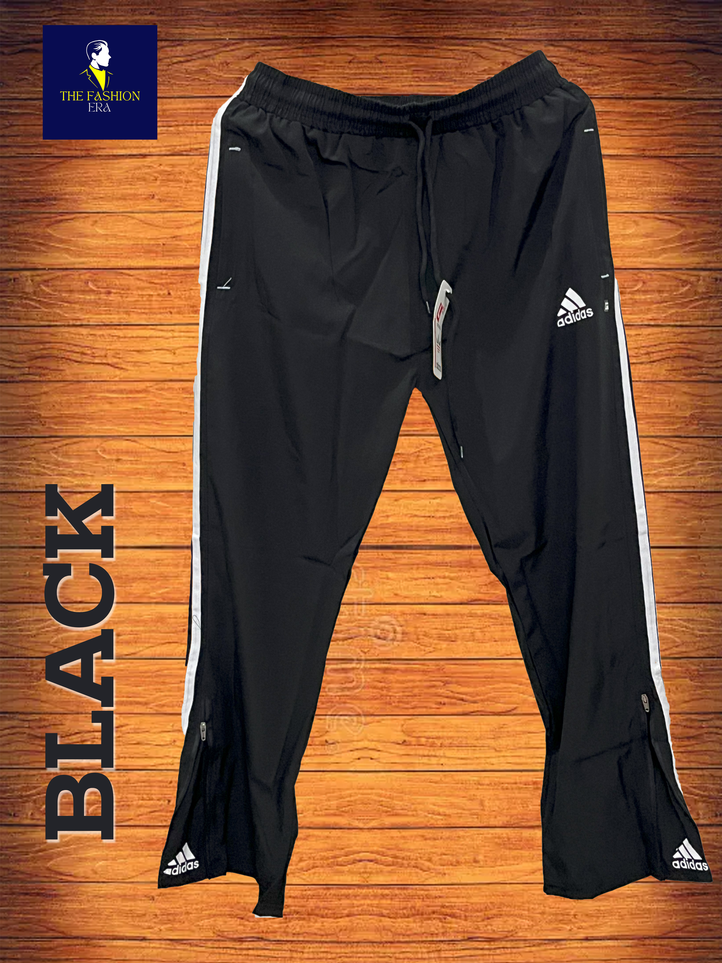 track pants featuring the iconic Adidas three-stripe design along the sides.