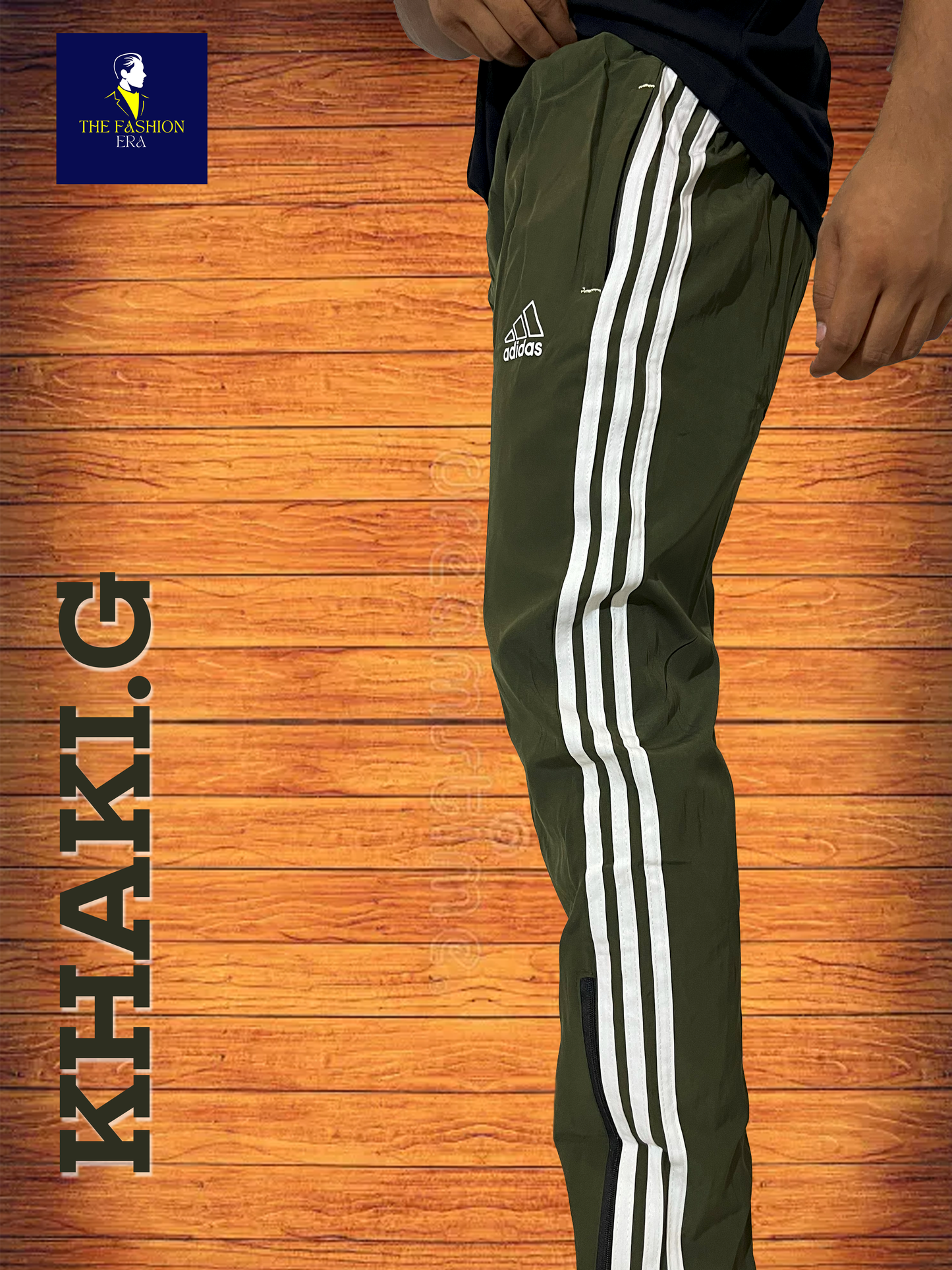 track pants featuring the iconic Adidas three-stripe design along the sides.